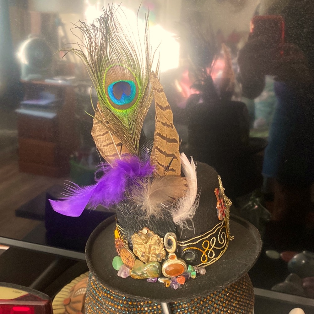 One of a kind, steam punk influenced top hat With feathers and Vintage decor